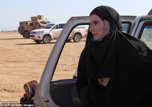 AK-47-wielding jihadi bride who was accused of enslaving a Yazidi woman after joining ISIS in Syria walks FREE from German court with two-year suspended sentence after vowing to 'reintegrate into society'