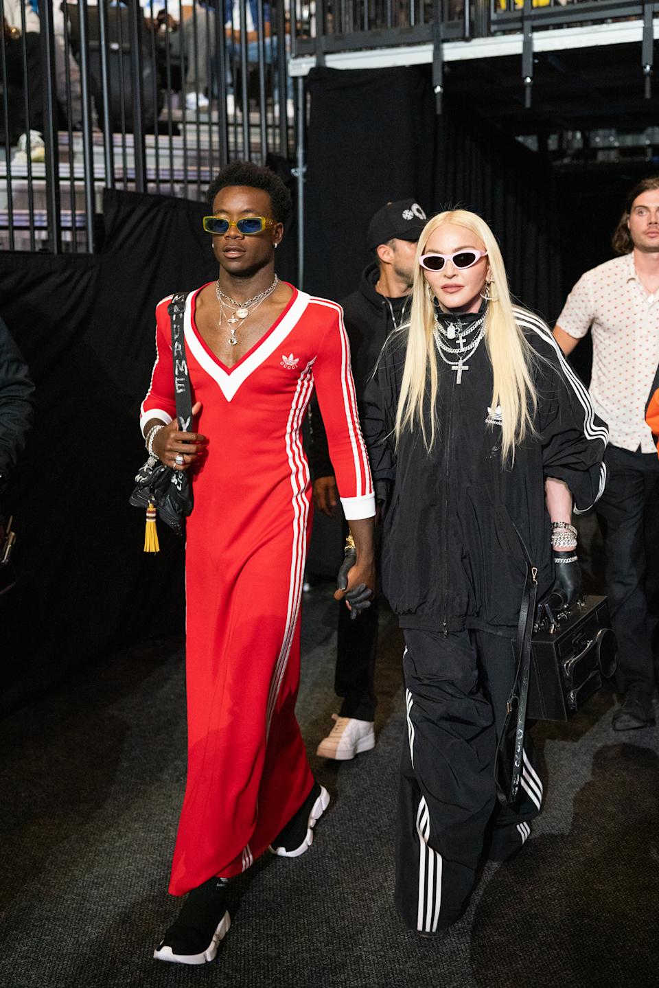 Madonna’s son David Banda looks chic in Adidas x Gucci collection red dress