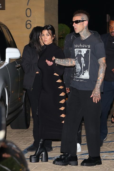 Kourtney Kardashian Wears a Cutout Dress and Platform Boots on a Date with Husband Travis Barker