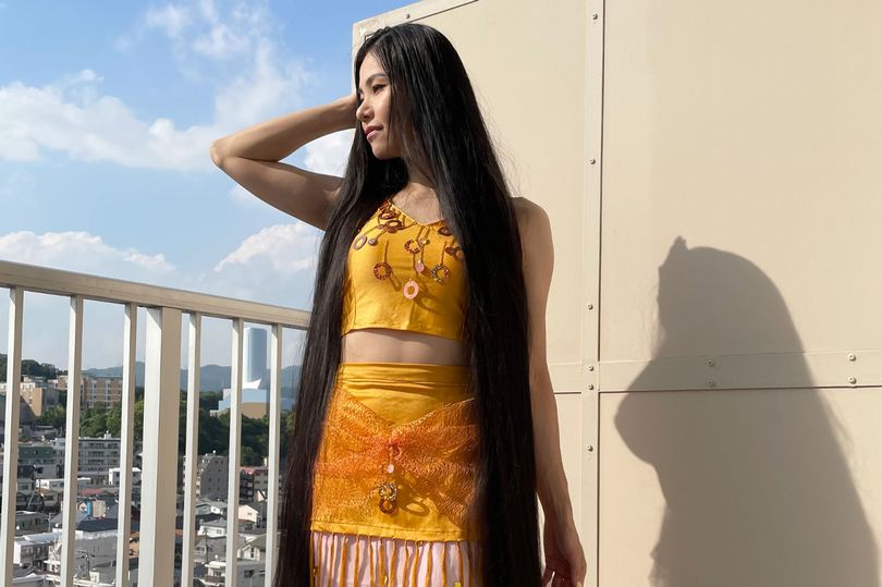 Real-life Rapunzel with hair almost 7ft long hasn't had a trim in 17 years