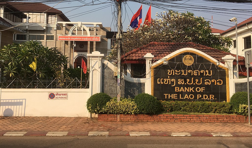 Laos installs new central bank chief, limits FX sales