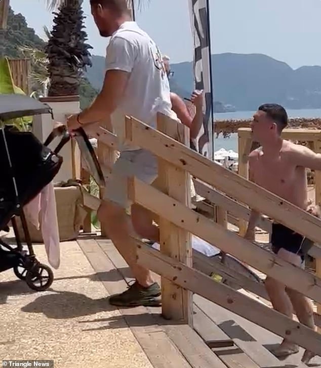 Moment Man City star Phil Foden had beach bust-up with WAG Rebecca Cooke on Corfu family break 'after she looked at his phone'