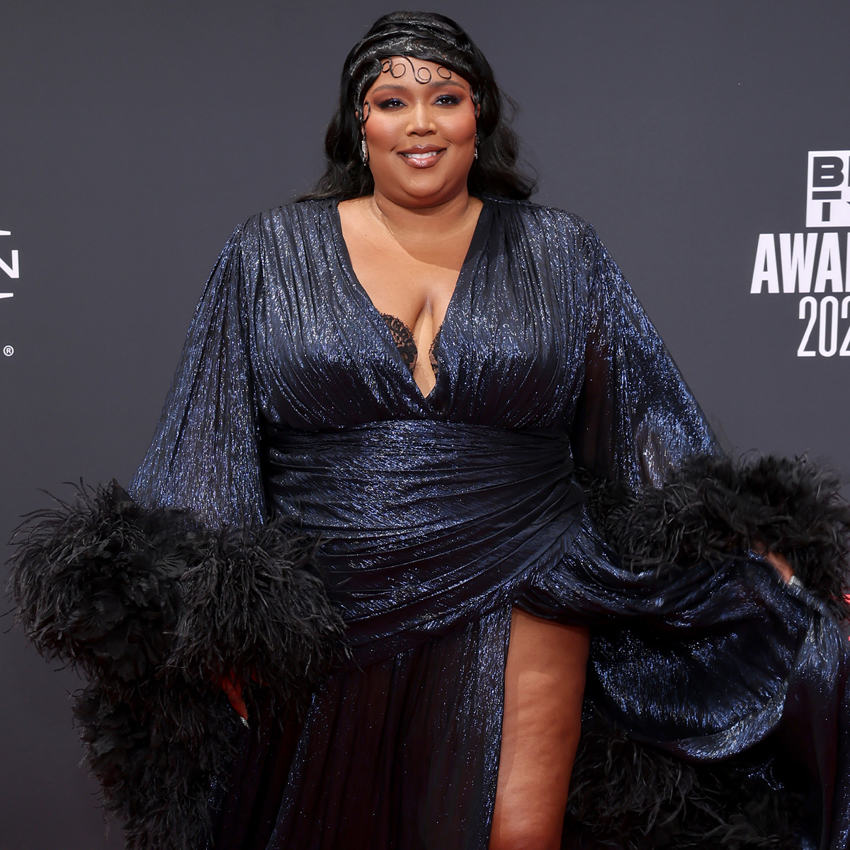 All the Rumors Are True Lizzo’s Red Carpet Look at the 2022 BET Awards