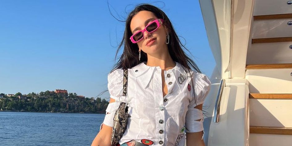 Dua Lipa Emulates the Punk Schoolgirl Aesthetic on a Yacht