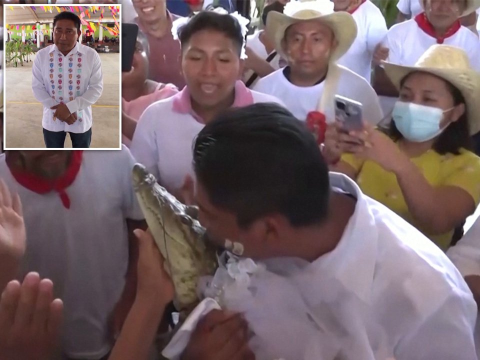 Mayor marries alligator wearing white wedding dress in historic ritual