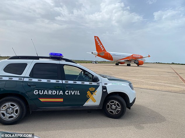 British teen arrested over bomb hoax that saw EasyJet flight to Menorca escorted by a fighter plane is released on £8,600 bail - but faces paying thousands more if convicted