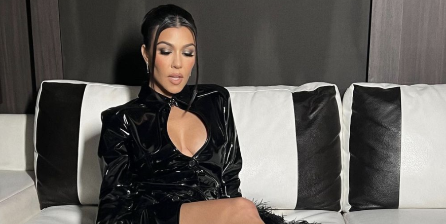 Kourtney Kardashian Is a Goth Queen in a PVC Feathered Cape Dress