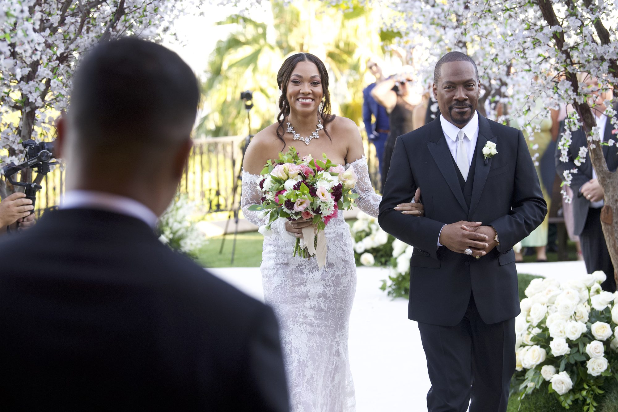 Eddie Murphy Hits the Dance Floor with Daughter Bria at Her Wedding to Michael Xavier 