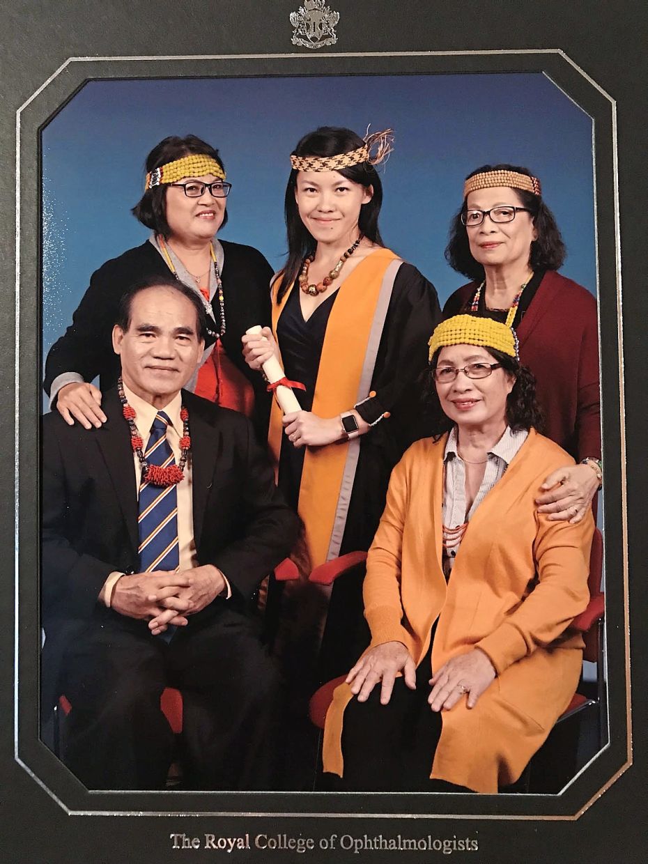 Scotland-based Sarawakian doctor wears Orang Ulu headgear for PhD graduation