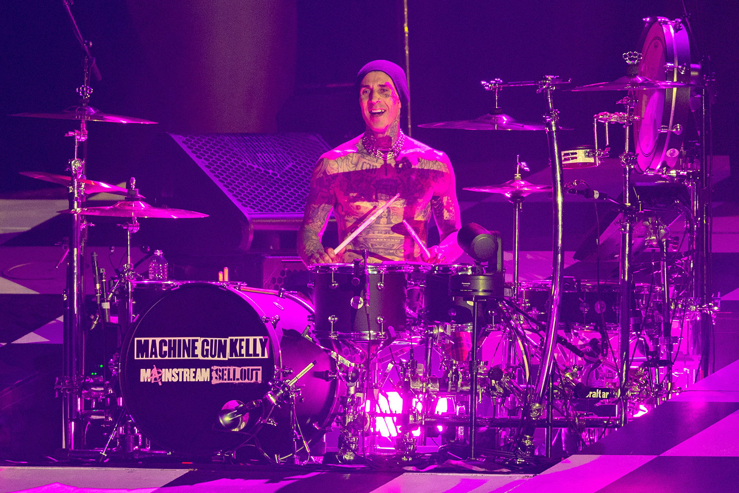 Travis Barker Plays Drums for MGK at Concert After Heath Scare — While Kourtney Cheers Him On!