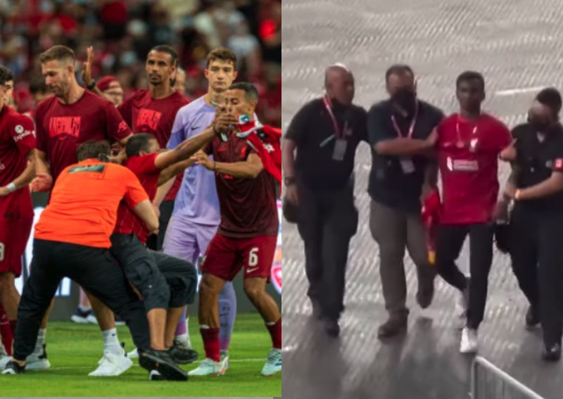 most-were-cheering-on-2-fans-run-onto-football-pitch-after-liverpool