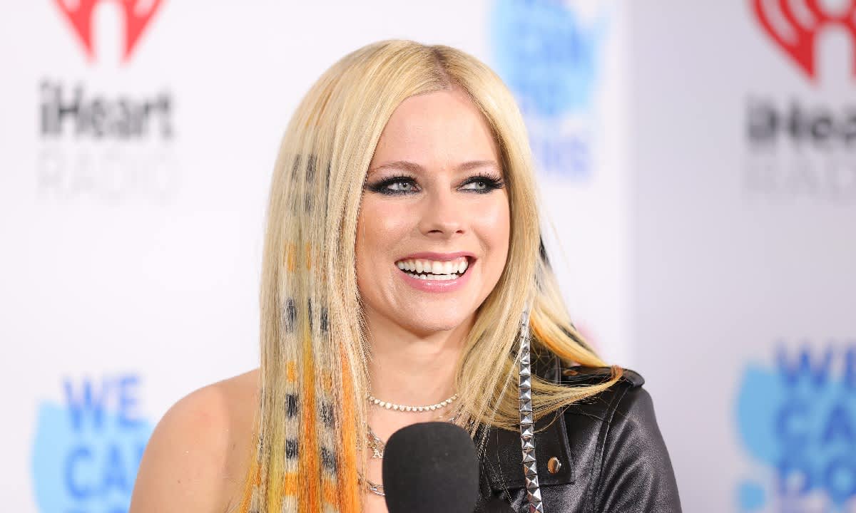 Avril Lavigne ditches her trademark stage look for new Versace jacket