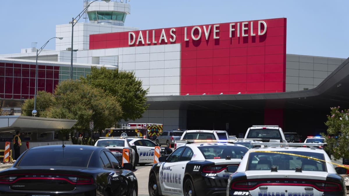 Woman opens fire at Dallas Love Field and is shot and arrested