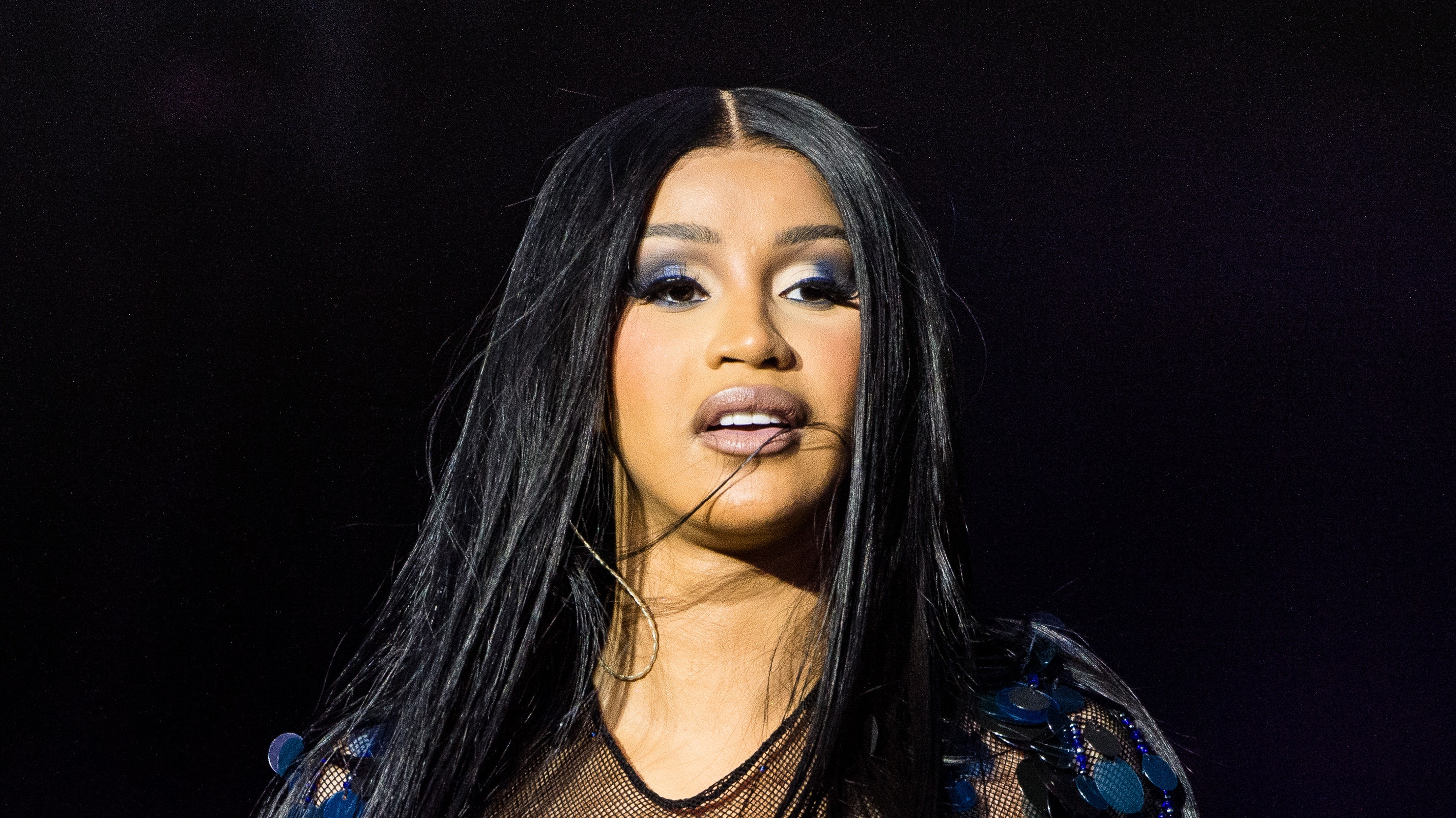 Cardi B Is an Emo Princess In Black Pigtails With Chunky Red Streaks