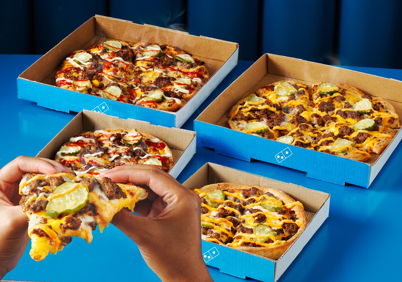 Domino's Australia is launching a new pizza burger to rival McDonald's and Hungry Jacks