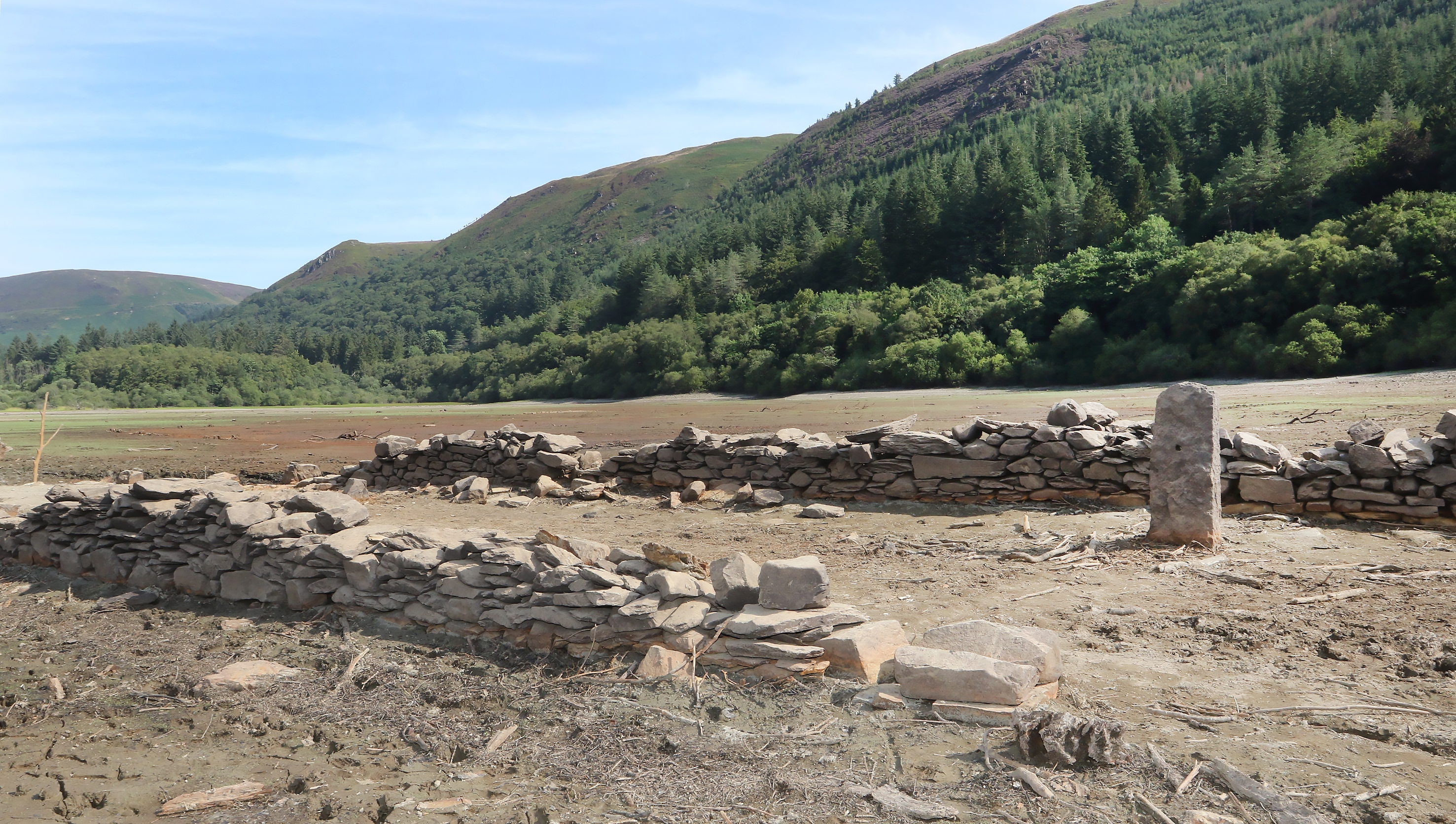 Hidden underwater village seen for first time in 40 years as lake dries up