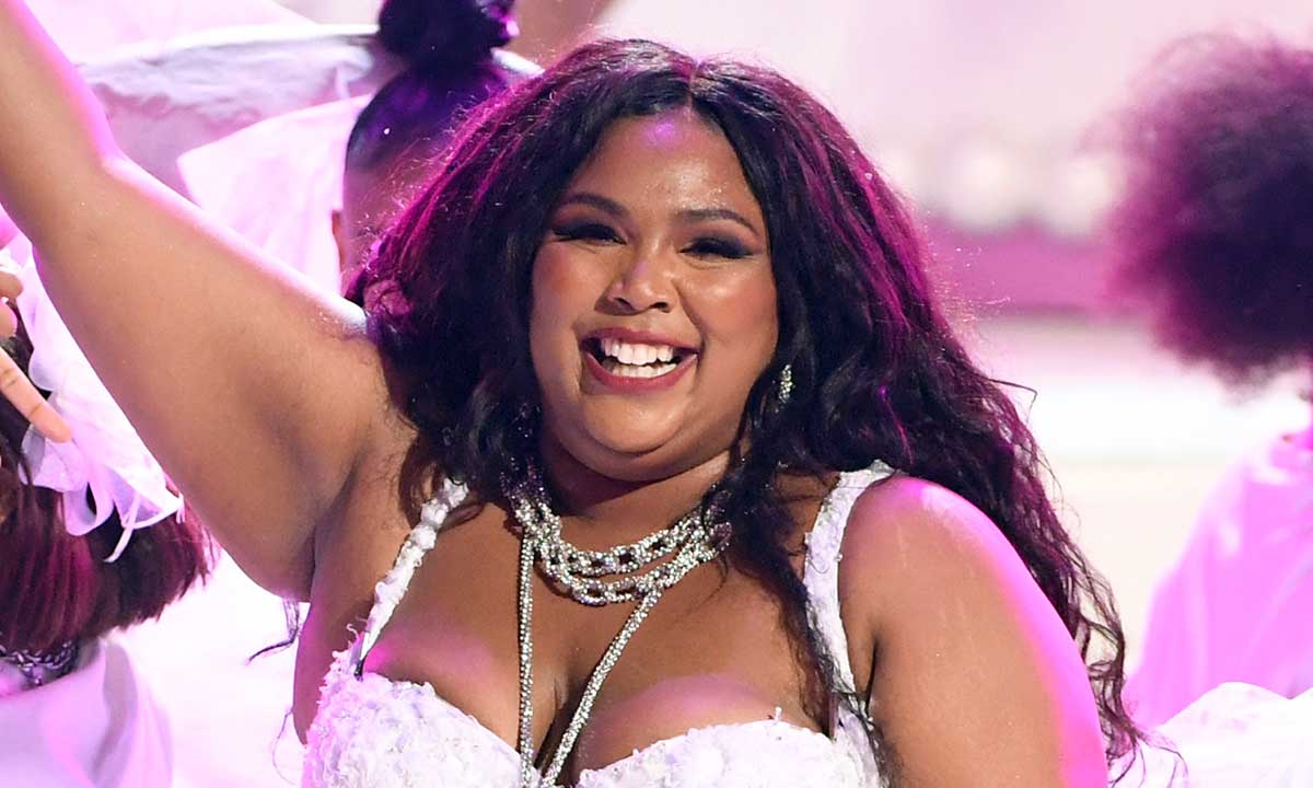 Lizzo looks incredible in revealing wedding dress with daring thigh-split