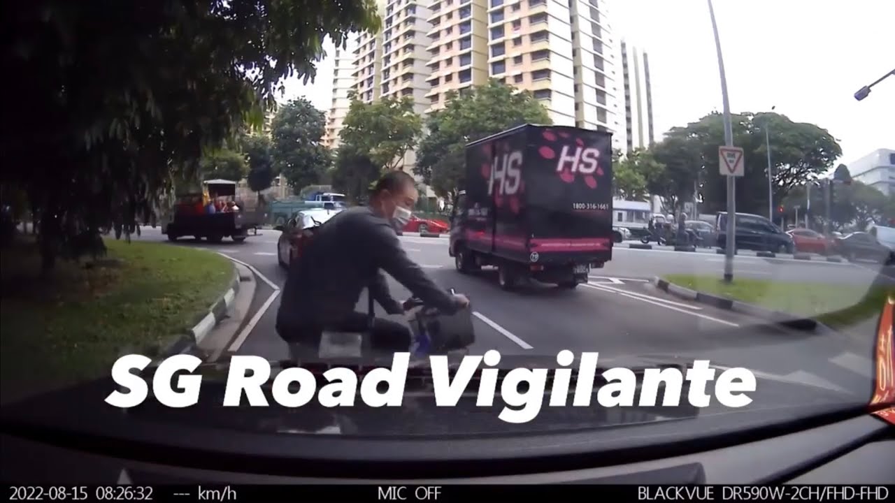 International Road camcar near miss with cyclist at zebra crossing