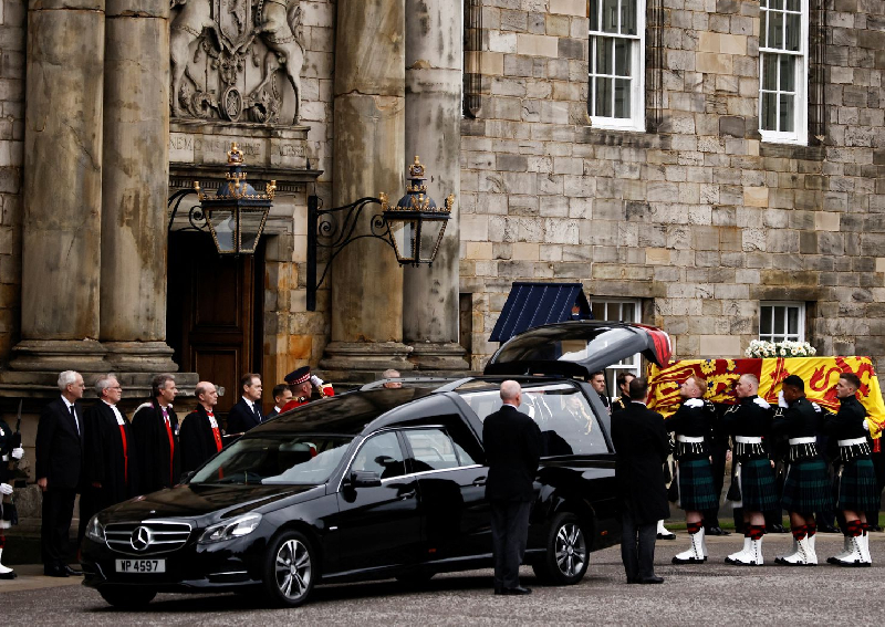 Queen Elizabeth's coffin travels through Scotland on 'last great journey' as mourners line streets