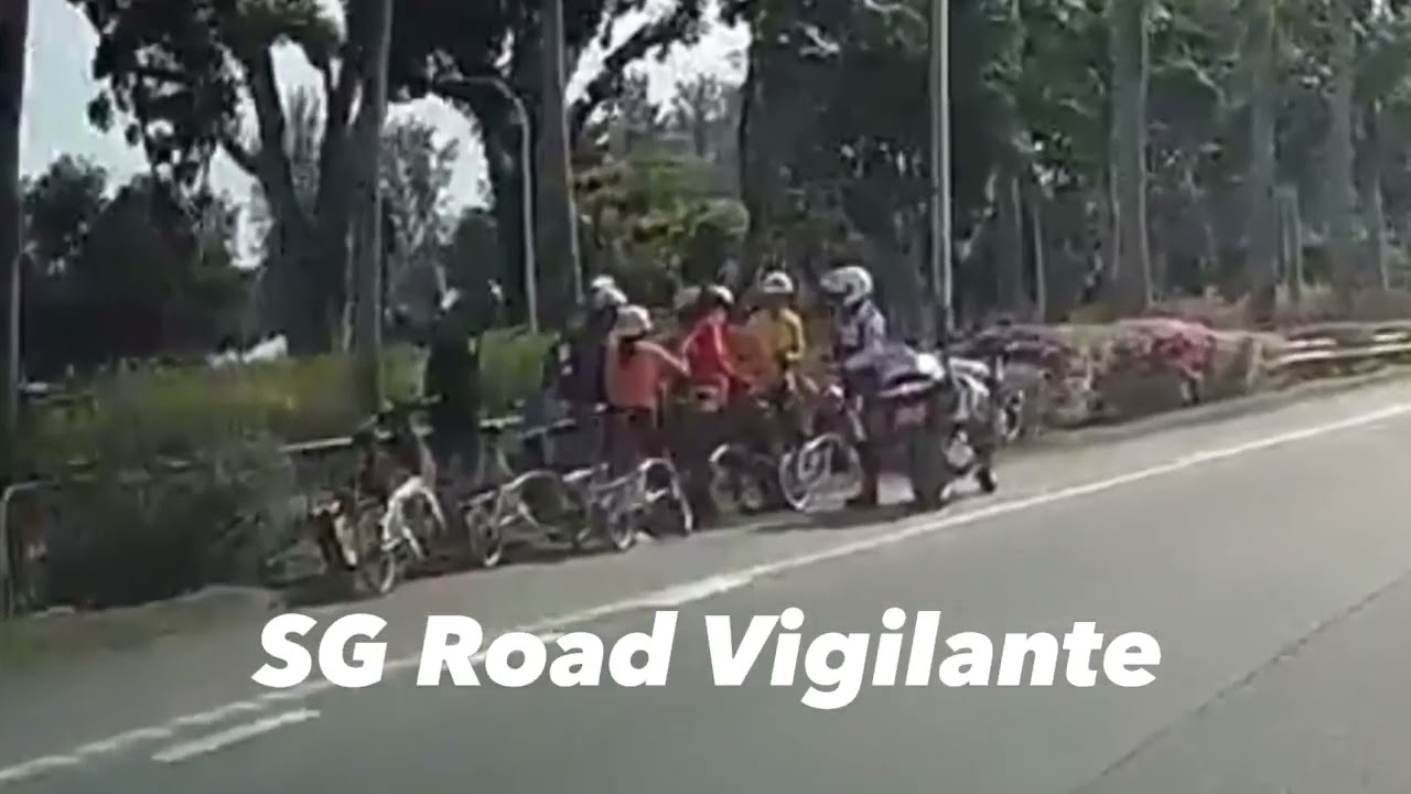 ecp cyclist on the expressway stopped by singapore traffic police officer