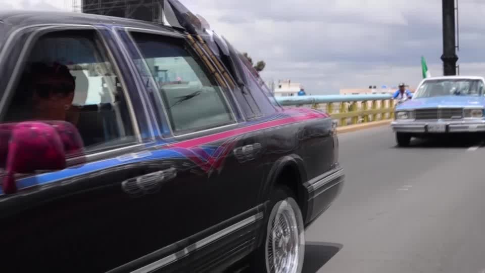 Lowrider cars parade for Mexico's independence day