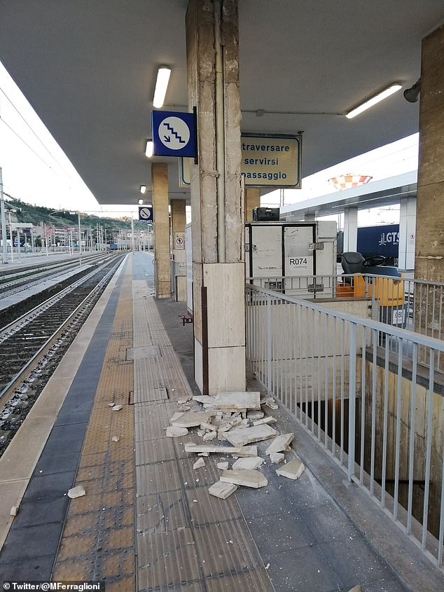 Terrified locals run into the streets as earthquake strikes off Italian resort of Rimini, causing damage to buildings