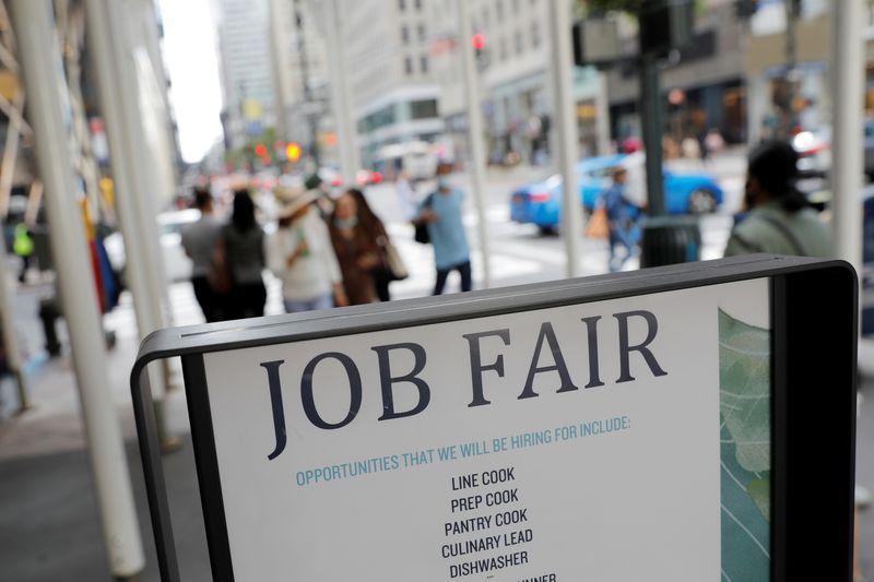 US weekly jobless claims edge lower