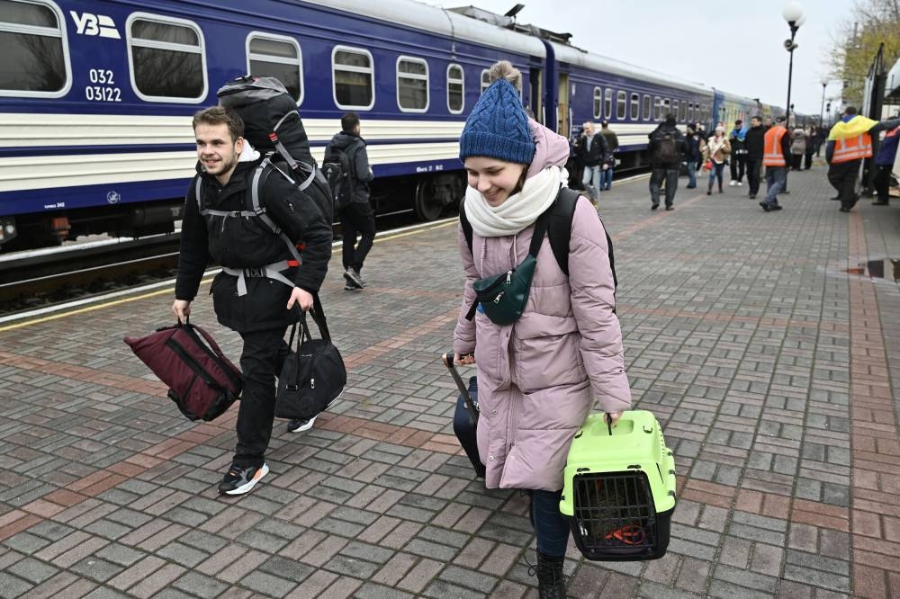 ‘We’re free’: Ukraine families reunite as Kherson train station reopens