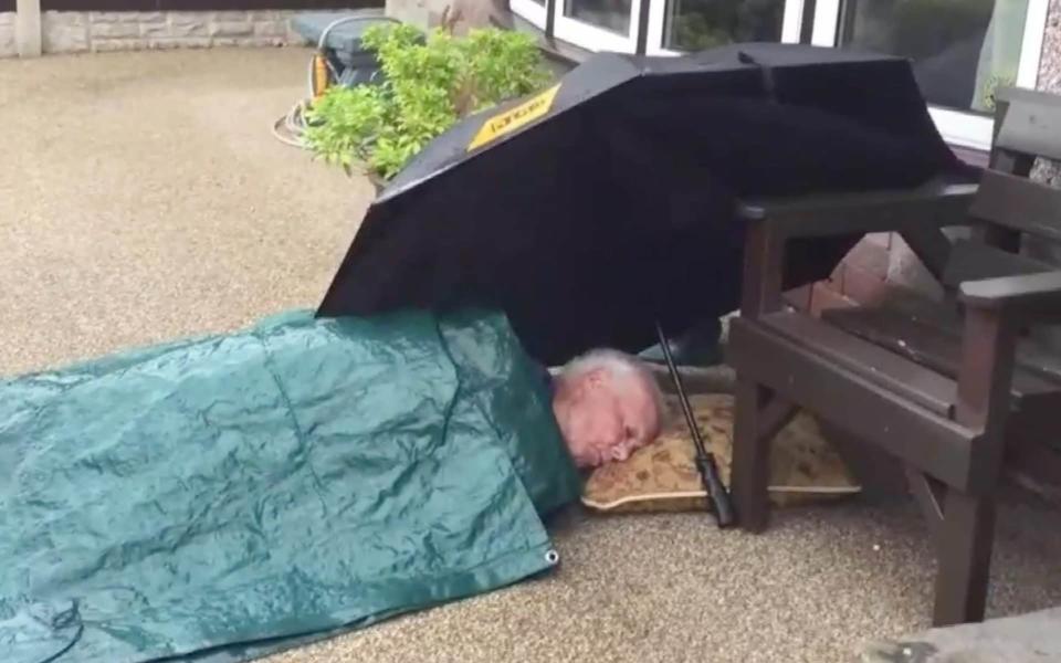 Elderly cancer patient with broken hip forced to wait seven hours in rain for ambulance