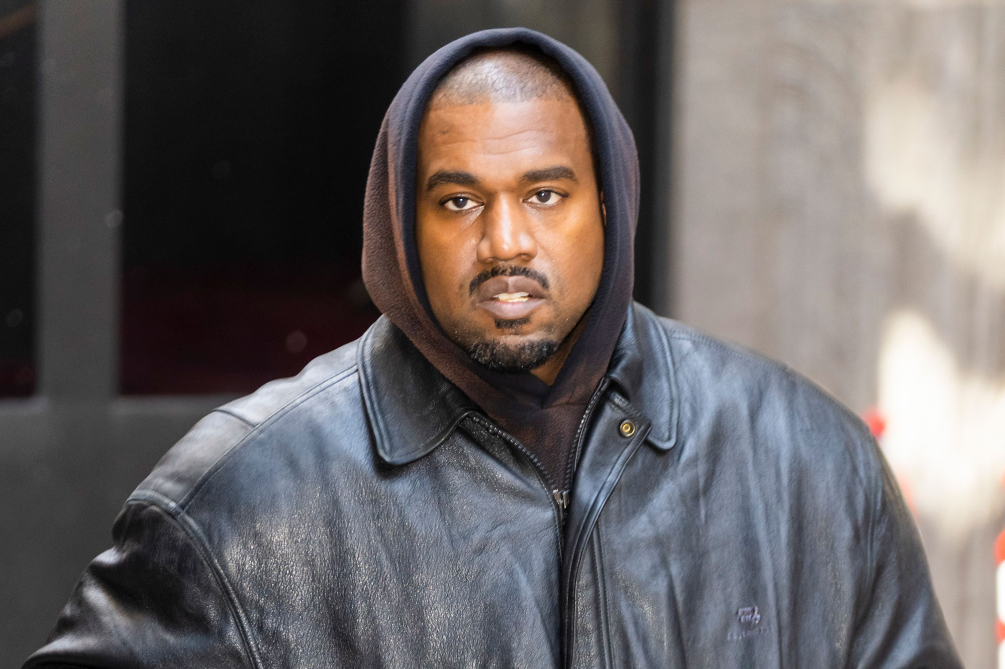 Kanye West suspended from Twitter again after sharing swastika post