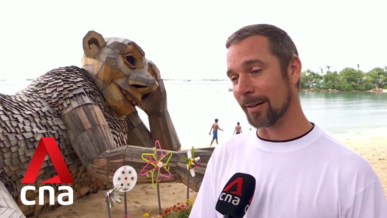 Four giant sculptures made of recycled wood on display at Sentosa’s Palawan Beach