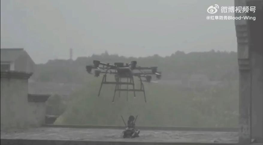 Terrifying video shows Chinese robot attack dog with machine gun dropped by drone