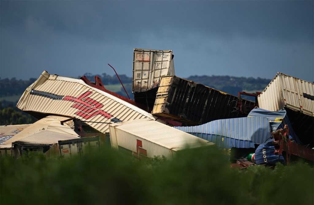 Australian train derails from flooded tracks in horrific scene