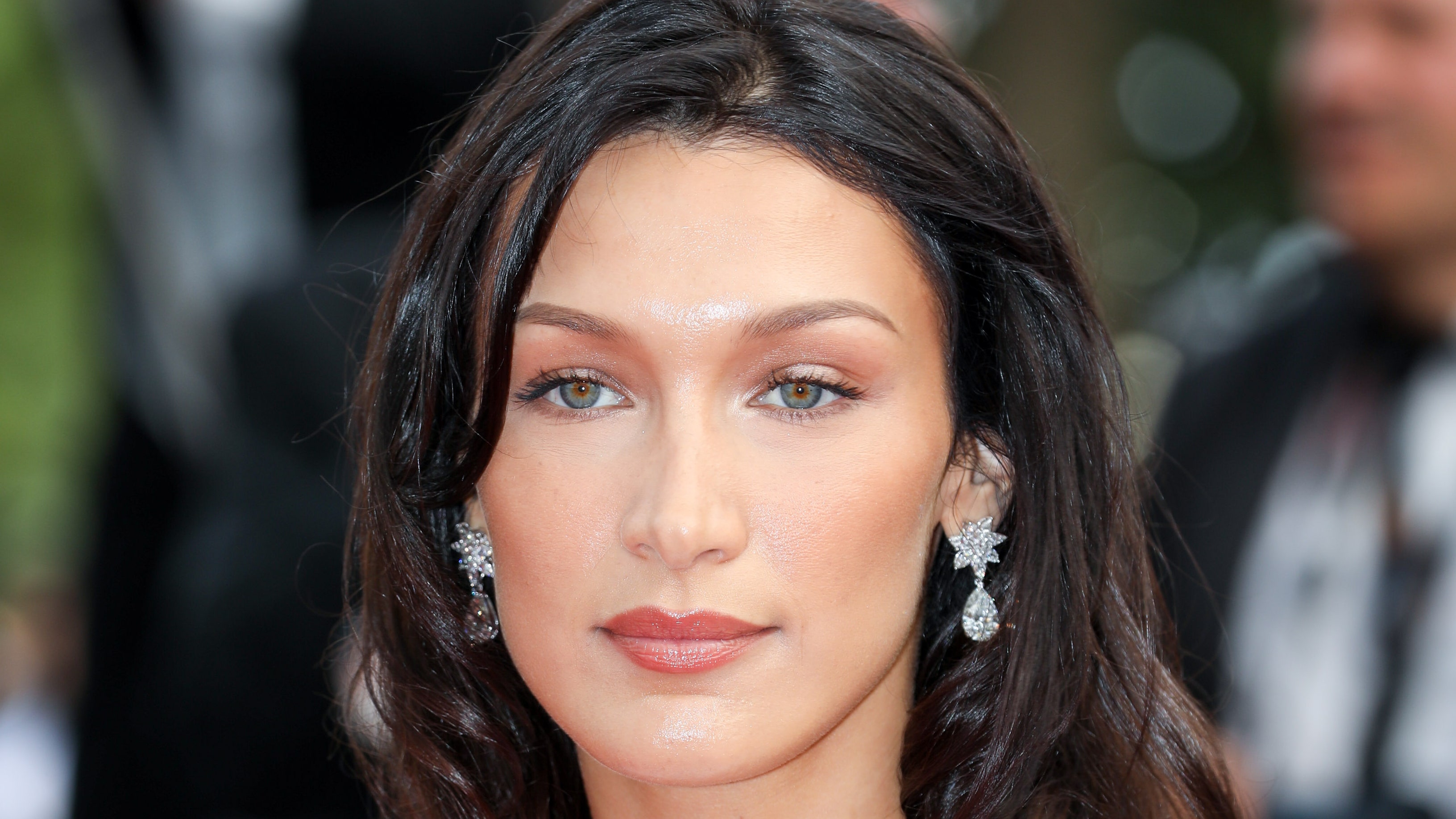Bella Hadid Channeled the Frazzled English Woman Aesthetic with Honey Blonde Waves and Cozy Layers