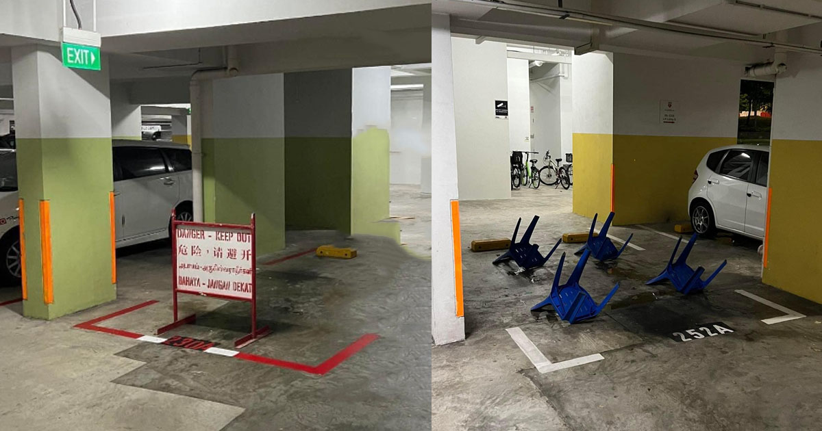 Toyota driver reserves parking lot with chairs & danger sign in Pasir Ris