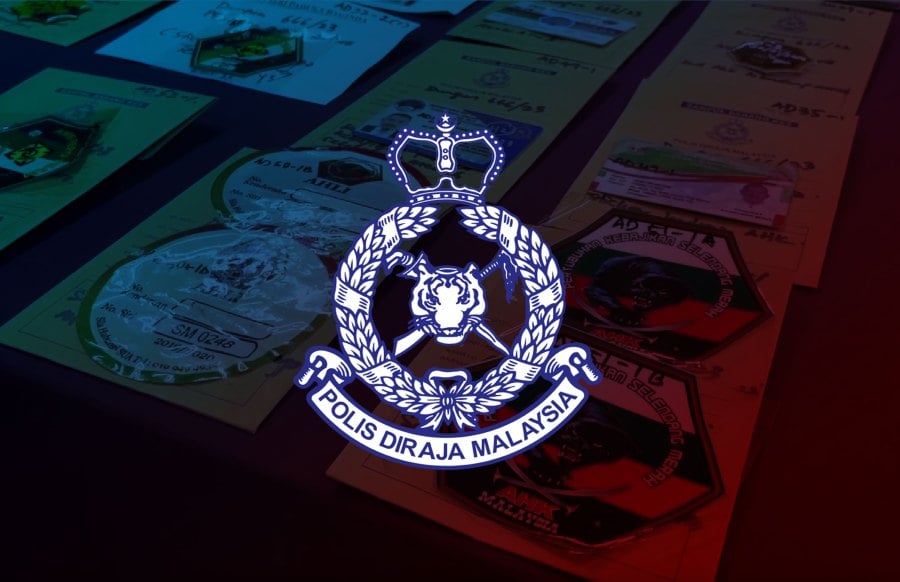 Two policemen who are members of Ayahanda Harimau Kumbang gang released under police bail