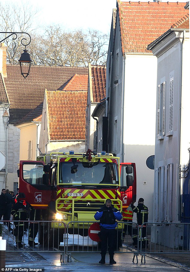 Pictured: Burnt out home of French mother and her seven children killed in fire caused by tumble dryer 'left on overnight to save on energy costs' as cops launch manslaughter probe