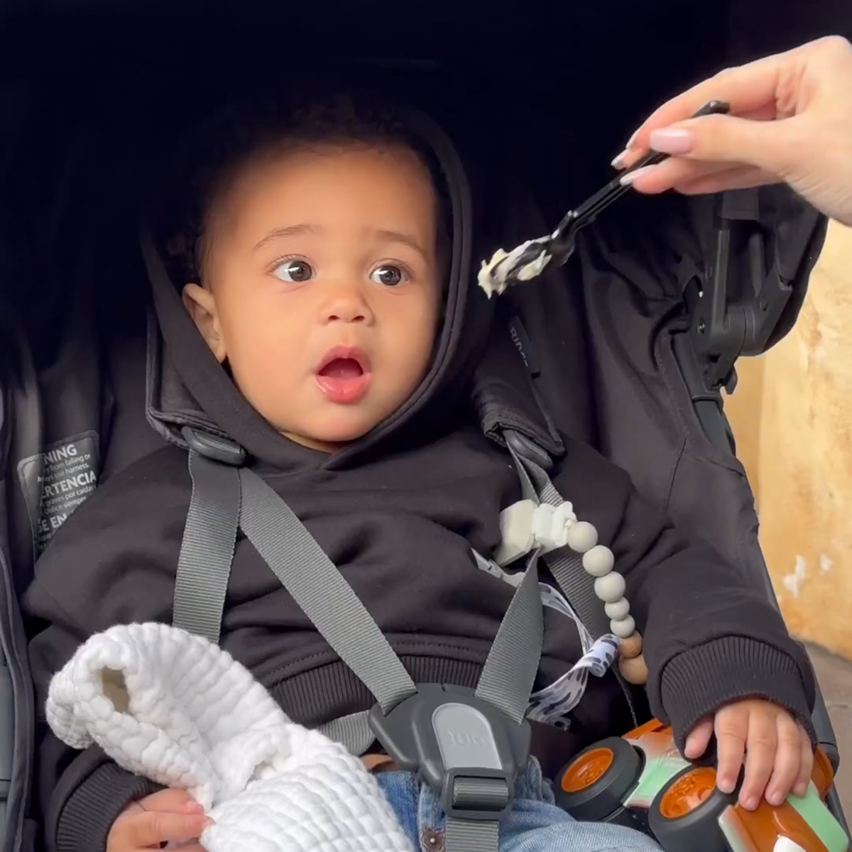 Watch Kylie Jenner and Travis Scott's Son Aire Taste His "First Ice Cream" at Disneyland