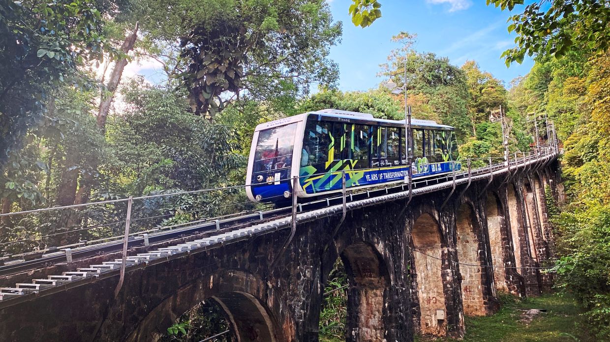 Penang hill trains decorated to mark 100th year milestone