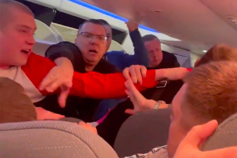 Thugs throw punches in bloody brawl on commercial flight as kids scream