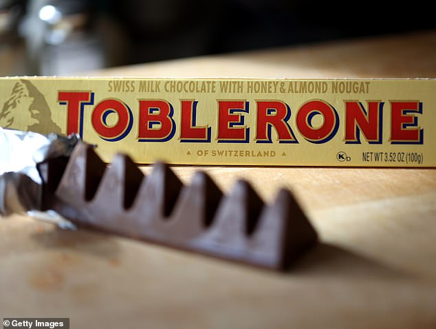 It's Tobler-GONE: First Toblerone bars go on sale without iconic Matterhorn image to comply with Swiss law