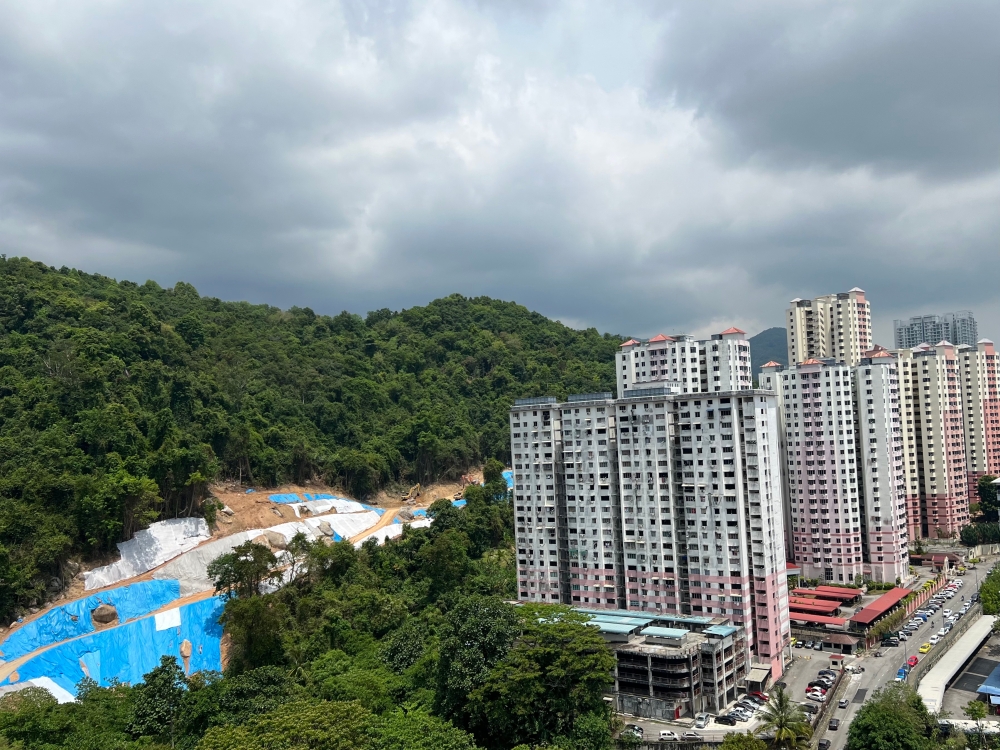 In Penang, high rise building residents say living in fear of landslides due to construction of highway on hill slope