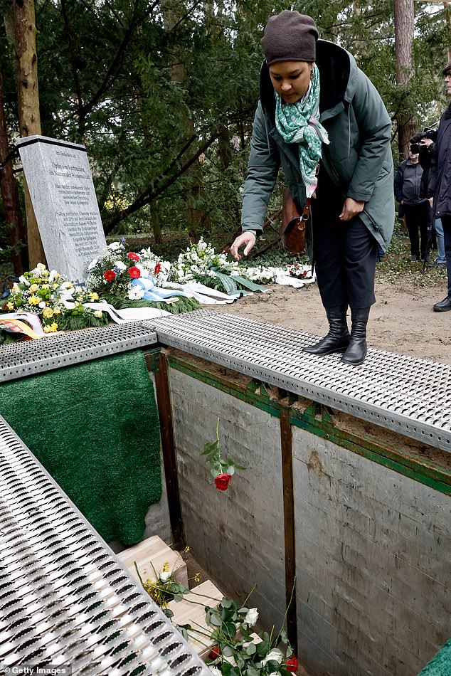Finally at peace, the victims whose bones were collected by Nazi scientists: Remains of at least 54 men, women and children are laid to rest in Germany after they were discovered during construction work