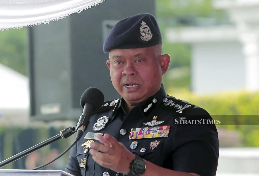 Hunt on for gang of 20 who ran riot at Johor Baru funeral home