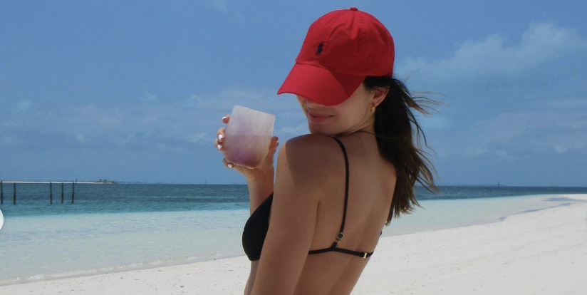 Kendall Jenner Soaks Up the Sun in a Black Triangle Bikini and Red Baseball Cap