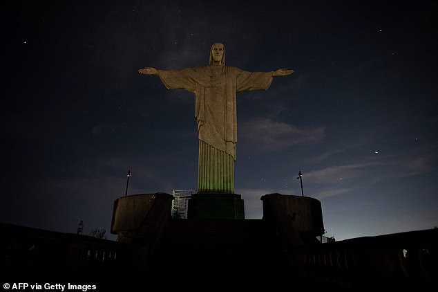 Lights on Christ the Redeemer statue are switched off in solidarity with Brazilian footballer Vinicius Jr after he suffered horrific racial abuse during Real Madrid match