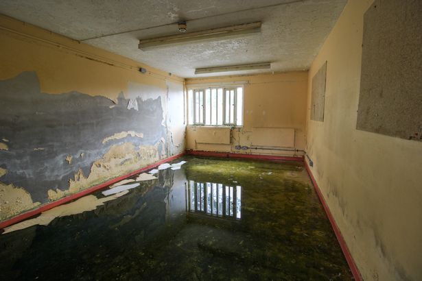 Inside abandoned UK juvenile prison with creepy height charts still on wall