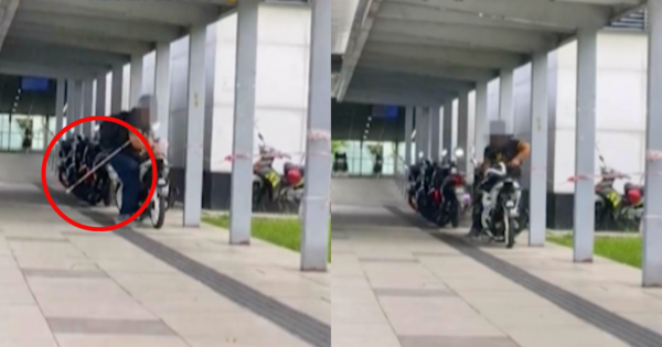 Woman Shows OKU Husband Painstakingly Moving Motorcycle Parked On Tactile Pavement