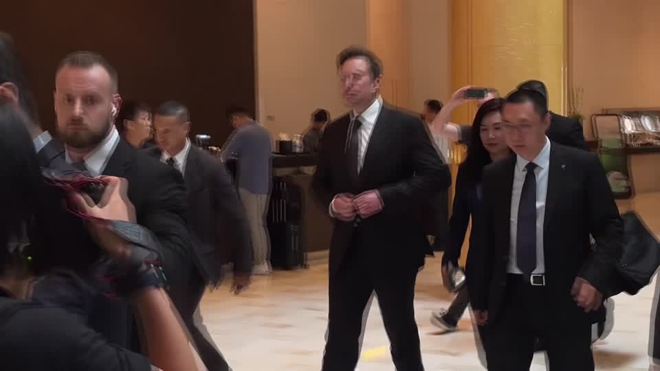 Elon musk greeted with flattery during China trip