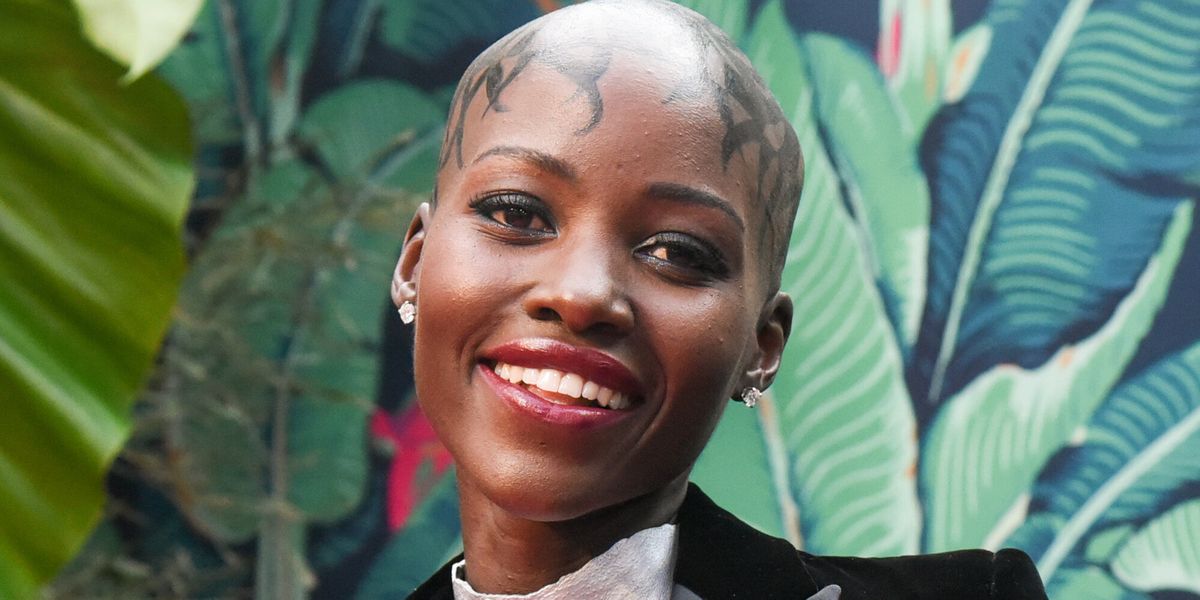 Lupita nyong'o stuns in 'shameless' silver breastplate at the tony awards